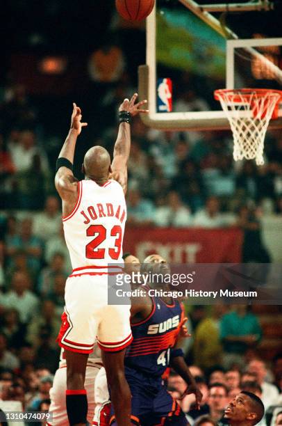 Michael Jordan shooting during the NBA Finals Game 2 between the Chicago Bulls and the Phoenix Suns, Phoenix, Arizona, June 11, 1993.