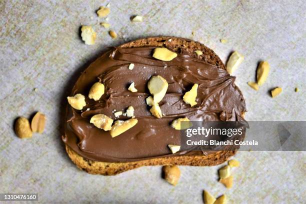 toast with chocolate and nuts - bread texture stock-fotos und bilder