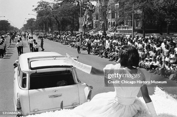 Floats at the Bud Billiken parade at 39th Street and South Park Way , Chicago, Illinois, August 8, 1964.