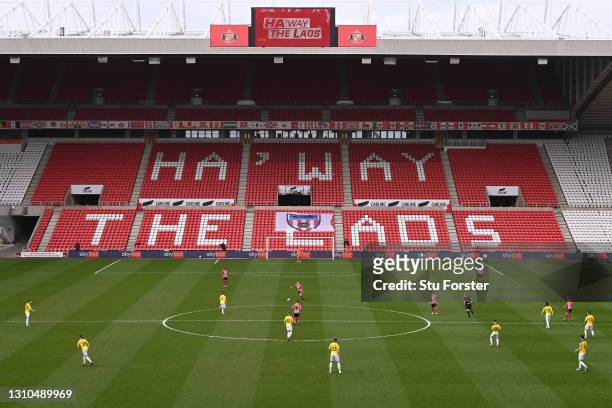 General viewof the action with the 'Ha'way the lads' signage seen on the empty seating during the Sky Bet League One match between Sunderland and...