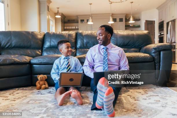 a young boy wants to be like dad - businesswear stock pictures, royalty-free photos & images