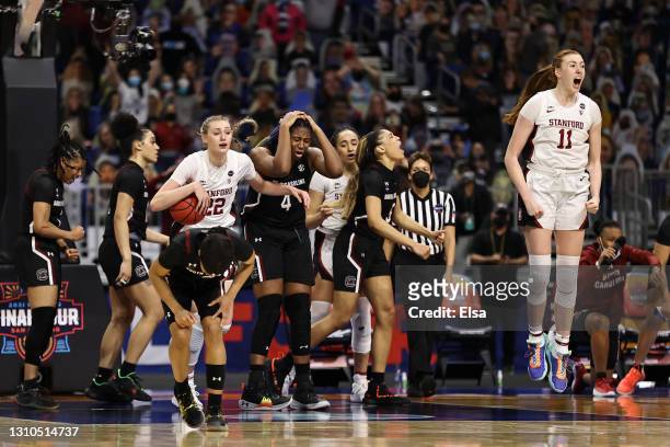 The Stanford Cardinal celebrate after defeating the South Carolina Gamecocks in the Final Four semifinal game of the 2021 NCAA Women's Basketball...