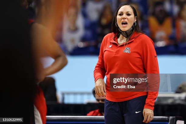 Head coach Adia Barnes of the Arizona Wildcats calls out to players against the UConn Huskies during the second quarter in the Final Four semifinal...
