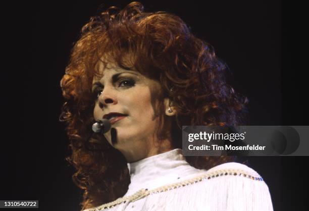 Reba McEntire performs at San Jose Arena on November 23, 1994 in San Jose, California.