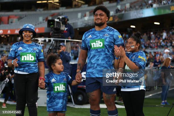 Ofa Tuungafasi of the Blues walks out with his family for his 100th game during the round 6 Super Rugby Aotearoa match between the Blues and the...