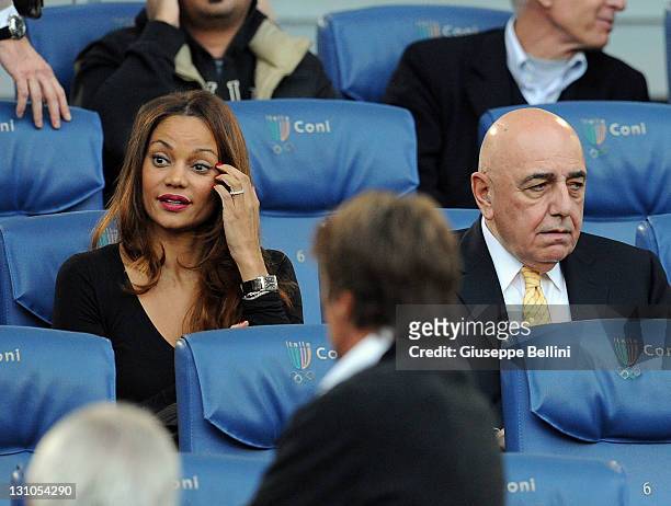 Helga Costa and Adriano Galliani of Milan during the Serie A match between AS Roma and AC Milan at Stadio Olimpico on October 29, 2011 in Rome, Italy.