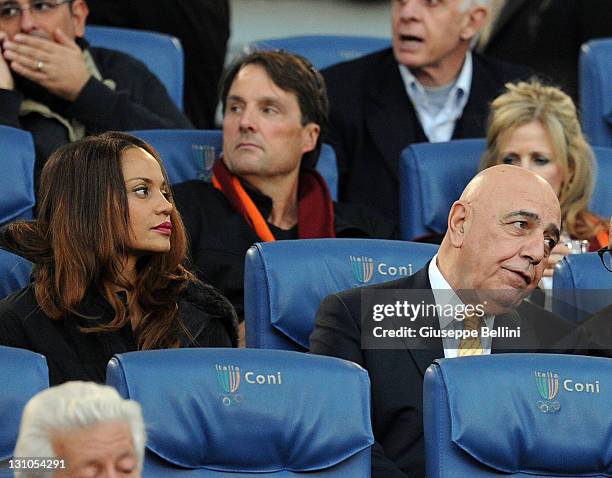 Helga Costa and Adriano Galliani of Milan during the Serie A match between AS Roma and AC Milan at Stadio Olimpico on October 29, 2011 in Rome, Italy.