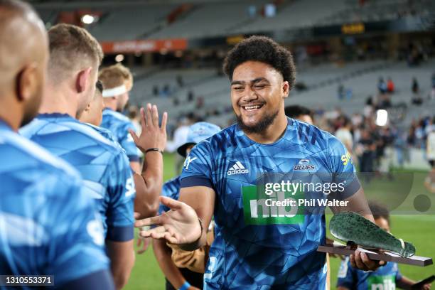 Ofa Tuungafasi of the Blues is congratulated on his 100th game during the round 6 Super Rugby Aotearoa match between the Blues and the Hurricanes at...