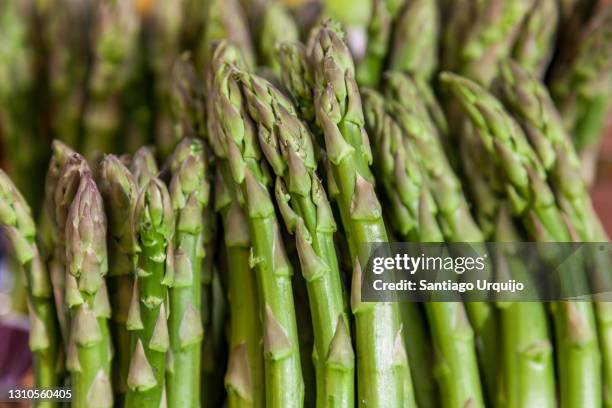 close up of green asparagus - full frame vegatable stock pictures, royalty-free photos & images