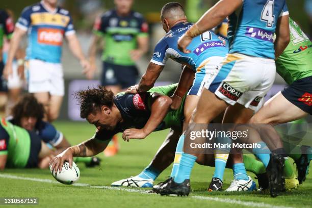 Josh Papalii of the Raiders scores a try during the round four NRL match between the Gold Coast Titans and the Canberra Raiders at Netstrata Jubilee...