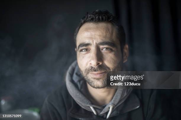 syrian male portrait - refugee camp stock pictures, royalty-free photos & images
