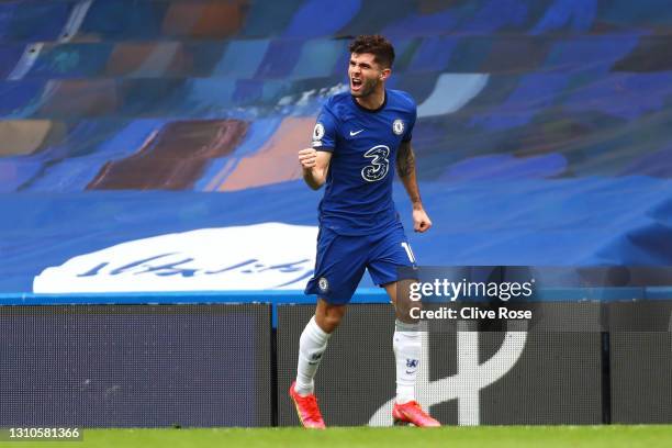 Christian Pulisic of Chelsea celebrates after scoring their team's first goal during the Premier League match between Chelsea and West Bromwich...