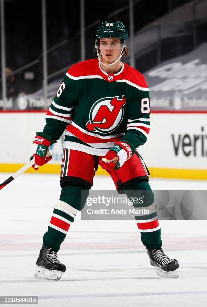 Jack Hughes of the New Jersey Devils skates against the Washington Capitals during the game at Prudential Center on April 2, 2021 in Newark, New...