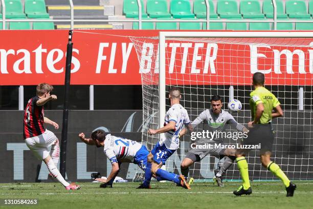 Jens Petter Hauge of A.C. Milan scores their team's first goal during the Serie A match between AC Milan and UC Sampdoria at Stadio Giuseppe Meazza...