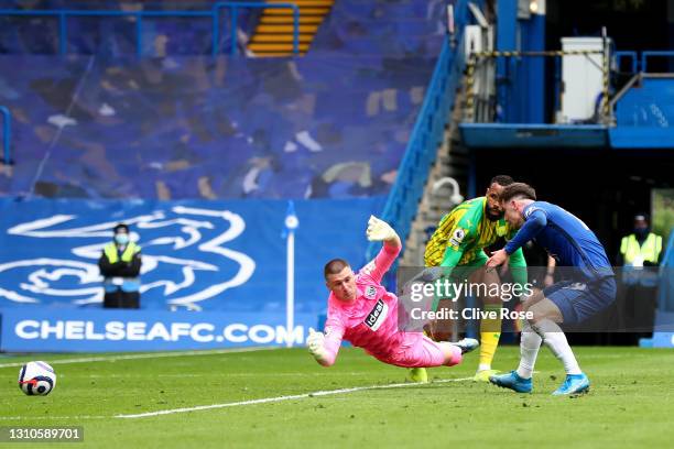 Mason Mount of Chelsea scores their team's second goal past Sam Johnstone of West Bromwich Albion during the Premier League match between Chelsea and...