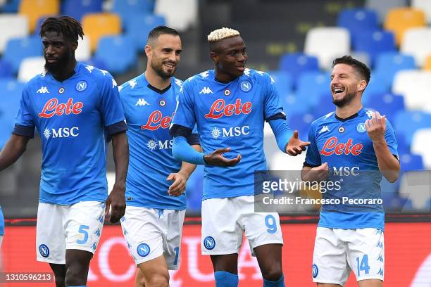 Dries Mertens of SSC Napoli celebrates with team mate Victor Osimhen after scoring their side's third goal during the Serie A match between SSC...