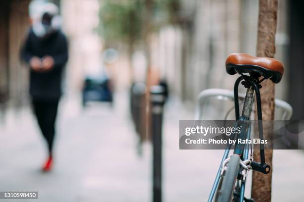 parked bicycle - pedestrian zone stock-fotos und bilder