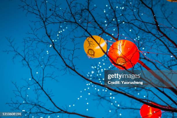 colorful fesitival lantern at chinese traditional holiday season - chinese lantern stockfoto's en -beelden