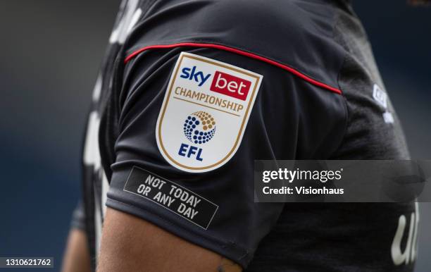 The official Sky Bet EFL Championship badge on the sleeve of a Brentford player above the anti racism slogan "NOT TODAY OR ANY DAY" during the Sky...
