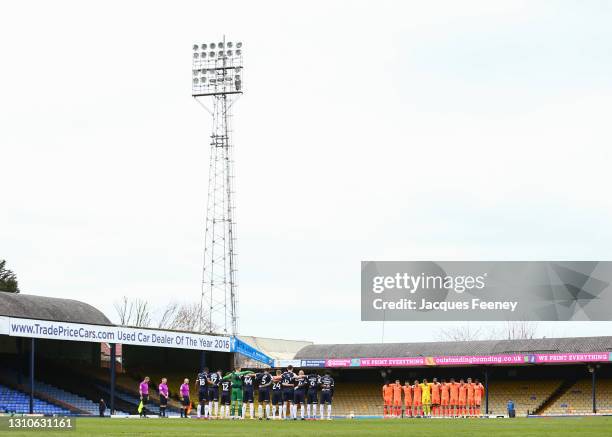 Both teams standing for a one minute silence in memory of Lee Collins during the Sky Bet League Two match between Southend United and Carlisle United...