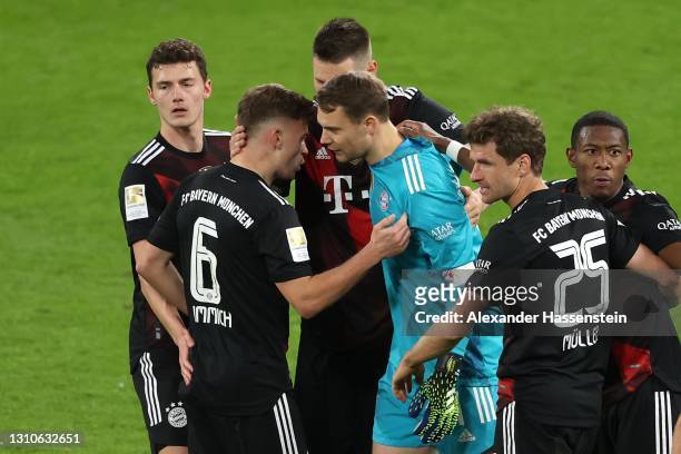 Manuel Neuer of FC Bayern München celebrates victory with his team mates after winning the Bundesliga match between RB Leipzig and FC Bayern Muenchen...