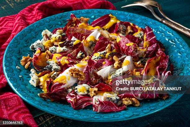 chicory salad with blue cheese, walnuts and dates - radicchio stock pictures, royalty-free photos & images