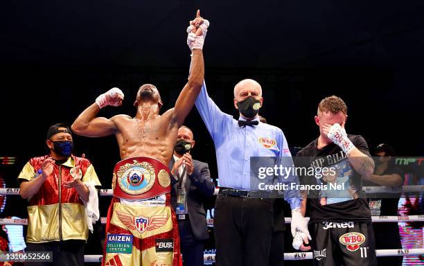 Jamel Herring of the USA celebrates victory as Carl Frampton of Northern Ireland reacts during the WBO World Super Featherweight Title Fight between...