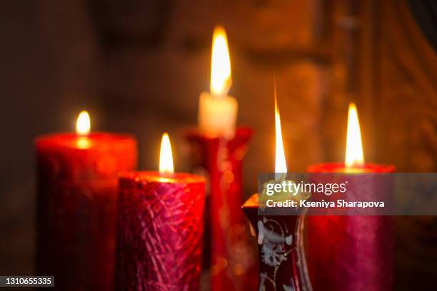 close-up of burning candles on table - stock photoo - ceremony imagens e fotografias de stock