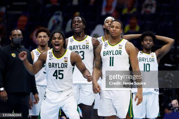 The Baylor Bears celebrate in the final minutes prior to defeating the Houston Cougars 78-59 in the 2021 NCAA Final Four semifinal to advance to the...