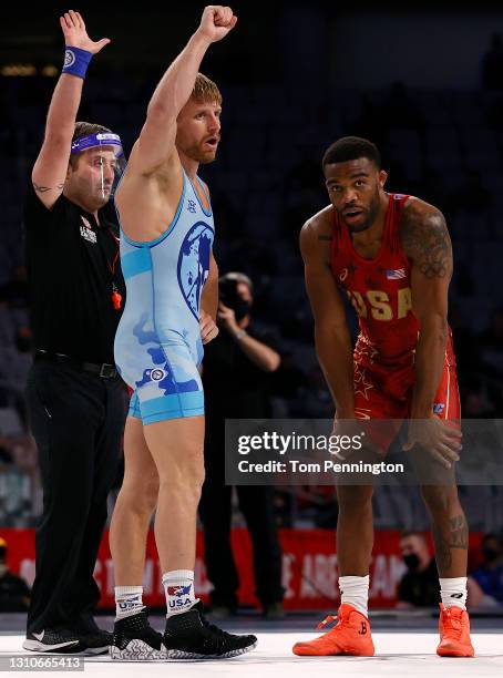 Kyle Dake celebrates after beating Jordan Burroughs in their Freestyle 74kg finals match on day 2 of the U.S. Olympic Wrestling Team Trials at...