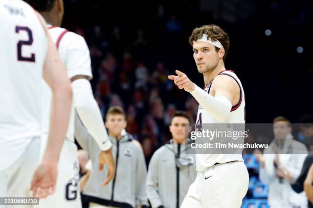 Corey Kispert of the Gonzaga Bulldogs reacts in overtime against the UCLA Bruins during the 2021 NCAA Final Four semifinal at Lucas Oil Stadium on...