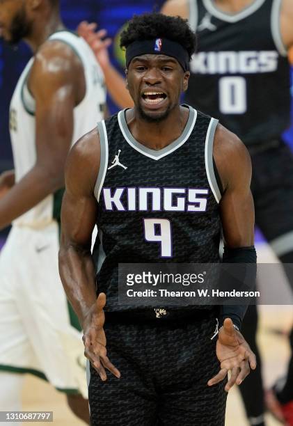 Terence Davis of the Sacramento Kings reacts to a call that went in favor of the Milwaukee Bucks during the second half of an NBA basketball game at...