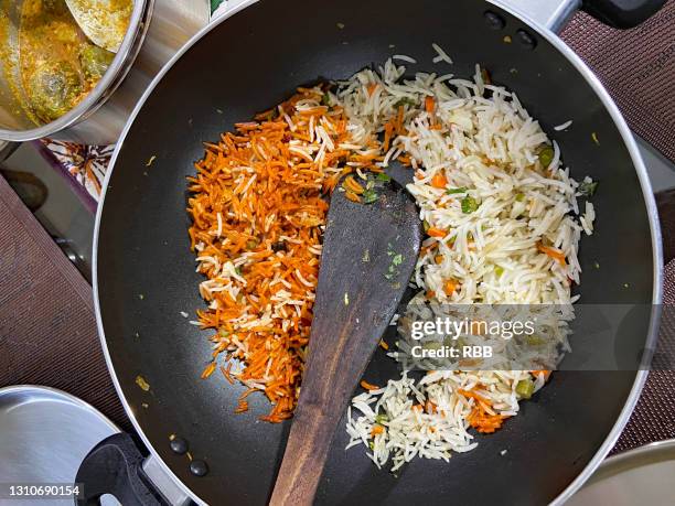 Someone Making Fried Rice Making Fried Rice Photos and Premium High Res Pictures - Getty Images