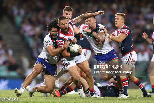 Jared Waerea-Hargreaves of the Roosters is tackled during the round four NRL match between the Sydney Roosters and the New Zealand Warriors at Sydney...