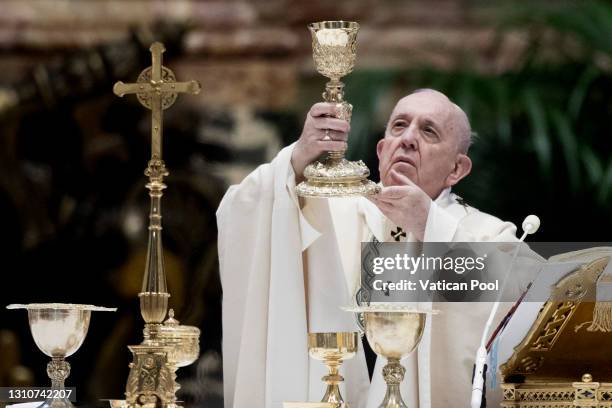 Pope Francis presides over Mass on Easter Sunday morning in St. Peter’s Basilica at the Altar of the Chair on April 04, 2021 in Vatican City,...