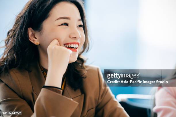 portrait of asian businesswoman in office. - japanese woman stock pictures, royalty-free photos & images