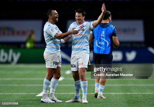 Francois Trinh-Duc and Simon Zebo of Racing 92 celebrate at full time of the Round of 16 Champions Cup match between Racing 92 and Edinburgh Rugby at...