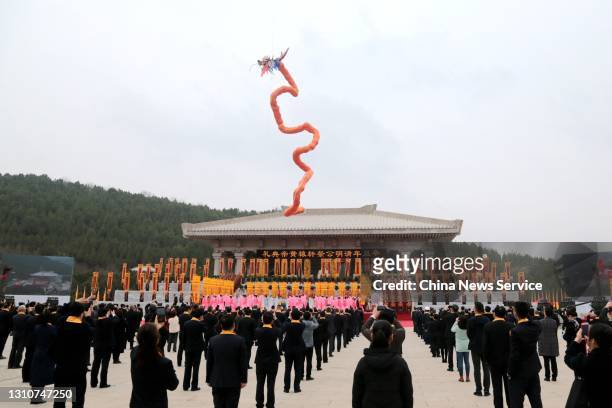 People attend an annual ceremony paying homage to the Yellow Emperor , who is regarded as a common ancestor for all Chinese, at the Mausoleum of the...