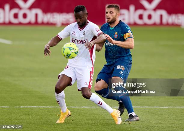 Pape Maly Diamanka of Albacete BP is challenged by David Lopez of RCD Espanyol during the Liga Smartbank match between Albacete BP and RCD Espanyol...