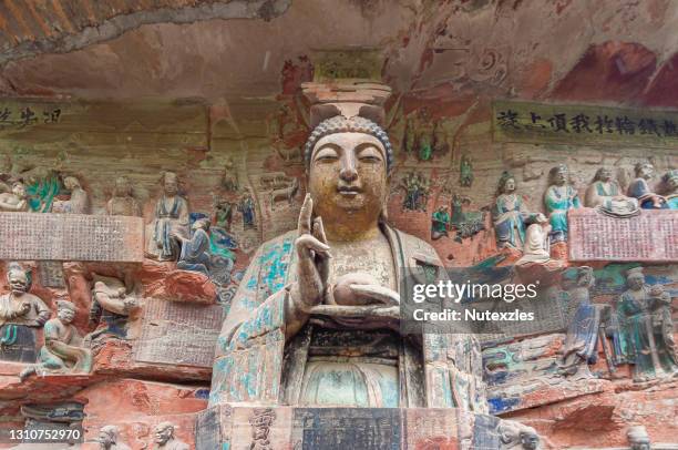 ancient giant buddhist hillside rock carving, western pure land - dazu, baodingshan, chongqing, china - tao stock pictures, royalty-free photos & images