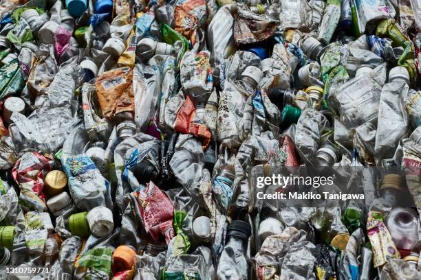 crushed plastic bottles - nuclear waste management stock pictures, royalty-free photos & images