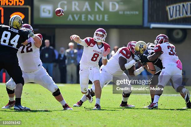 Quarterback Tyler Wilson of the Arkansas Razorbacks passes during a college football game against the Vanderbilt Commodores at Vanderbilt Stadium on...