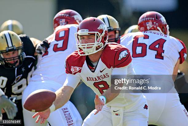 Quarterback Tyler Wilson of the Arkansas Razorbacks tosses the ball during a college football game against the Vanderbilt Commodores at Vanderbilt...