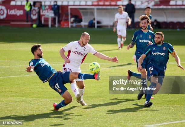 Roman Zozulia of Albacete BP competes for the ball with Didac Vila of RCD Espanyol during the Liga Smartbank match between Albacete BP and RCD...