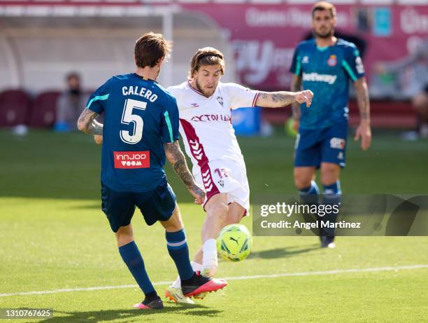 Alvaro Jimenez of Albacete BP competes for the ball with Fernando Calero of RCD Espanyol during the Liga Smartbank match between Albacete BP and RCD...