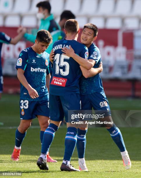 Wu Lei of RCD Espanyol celebrates with David Lopez at the end of the Liga Smartbank match between Albacete BP and RCD Espanyol de Barcelona at...