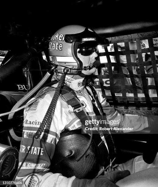 Driver Joe Ruttman sits in his racecar prior to the start of the 1986 Daytona 500 stock car race at Daytona International Speedway in Daytona Beach,...