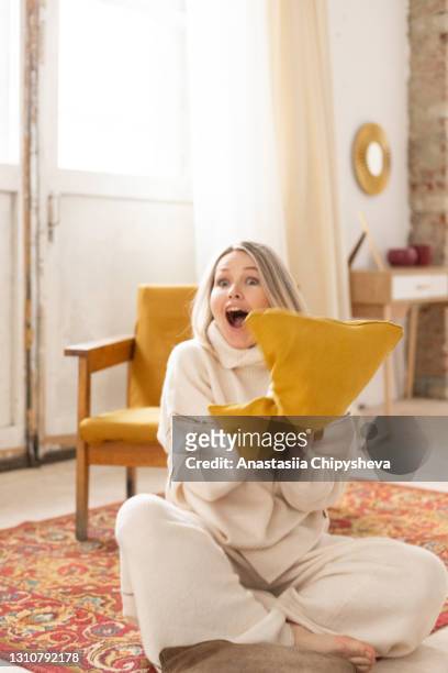 surprised woman - pillow case stock pictures, royalty-free photos & images