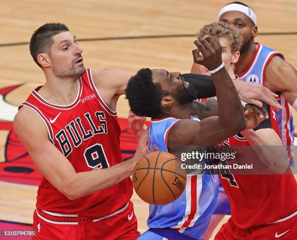 Nikola Vucevic of the Chicago Bulls fouls Jeff Green of the Brooklyn Nets at the United Center on April 04, 2021 in Chicago, Illinois. NOTE TO USER:...