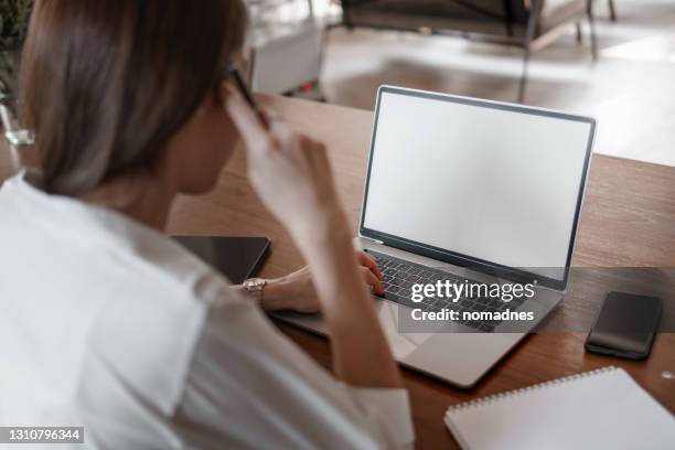 professional working with blank screen laptop computer template mock up. - blank screen stock pictures, royalty-free photos & images